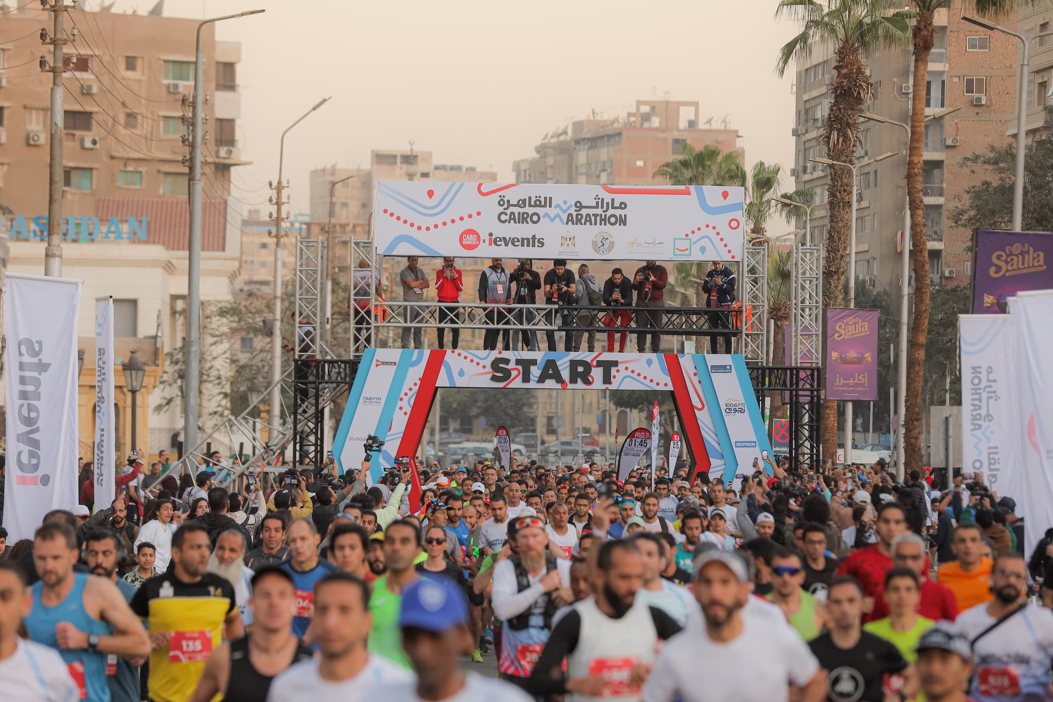 Runners crossing finish line